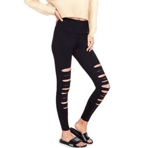 Victoria’s Secret pink ripped leggings